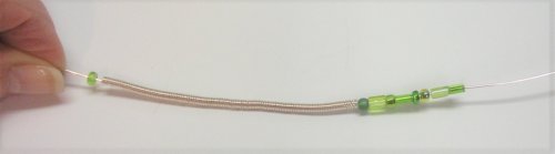 Judy Larson's Coiled, Beaded Slide - , Contemporary Wire Jewelry, Coiling, Coiling Wire, Wire Coiling, Flush cut the beginning end of the wire